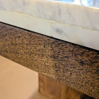 Close-up of a marble and wood surface