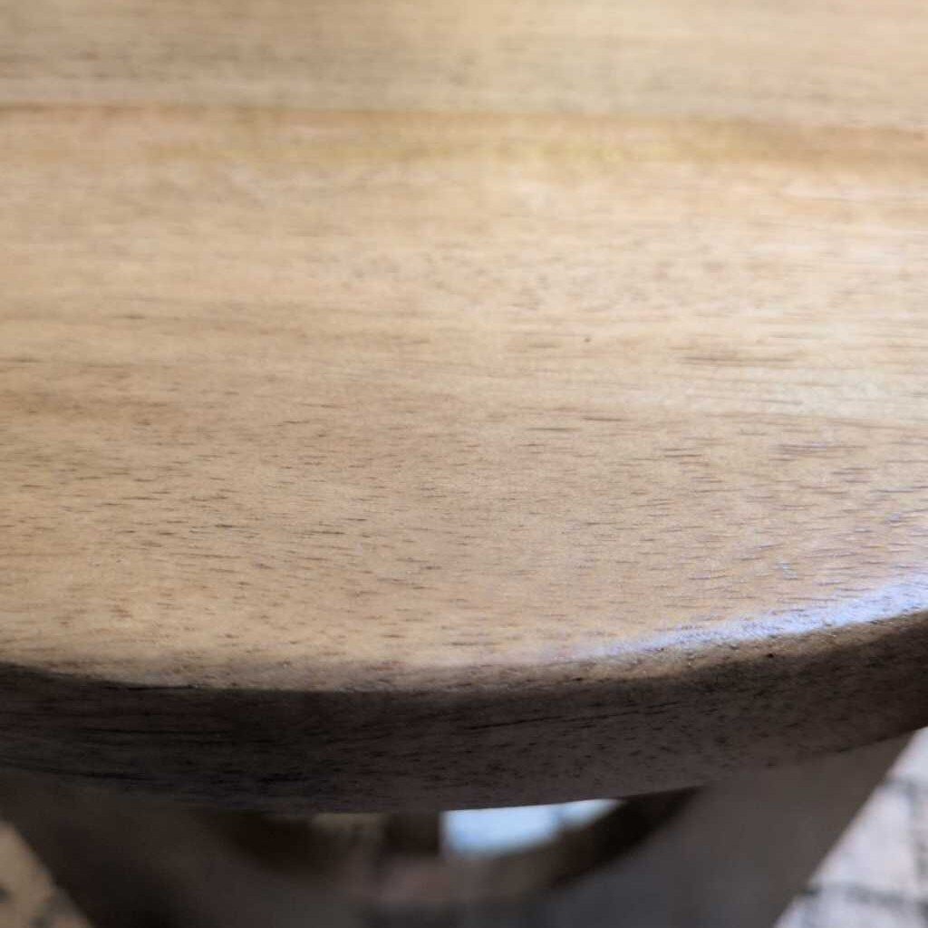 Close-up of a wooden surface with a blurred background