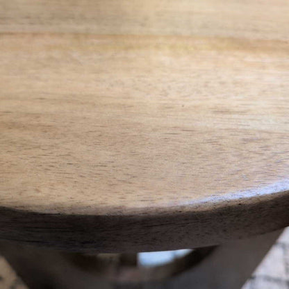 Close-up of a wooden surface with a blurred background