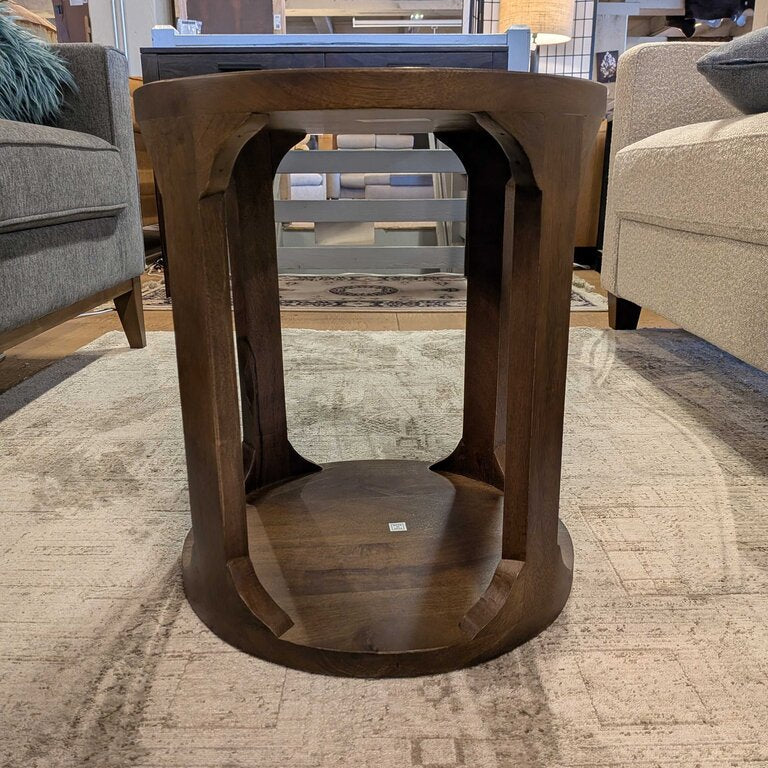 Wooden side table in a furniture store setting