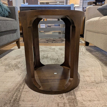 Wooden side table in a furniture store setting