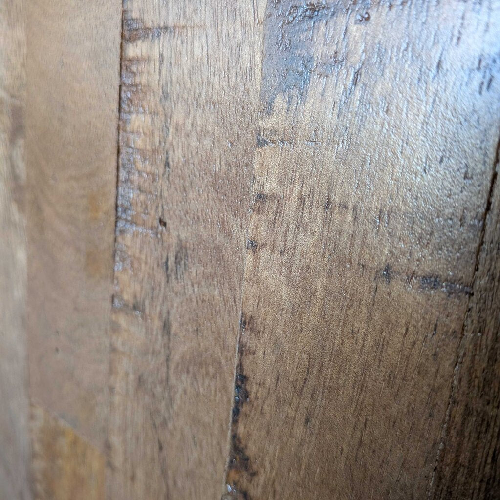 Close-up of wooden flooring with visible grain and color variations