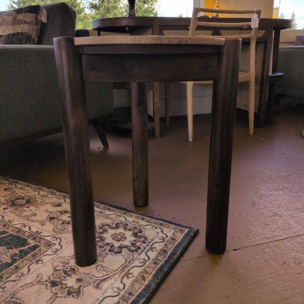 Wooden dining table with chairs in a room setting