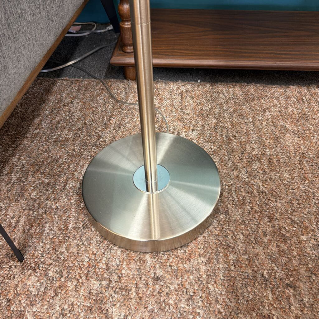 Metal stand on a carpeted floor