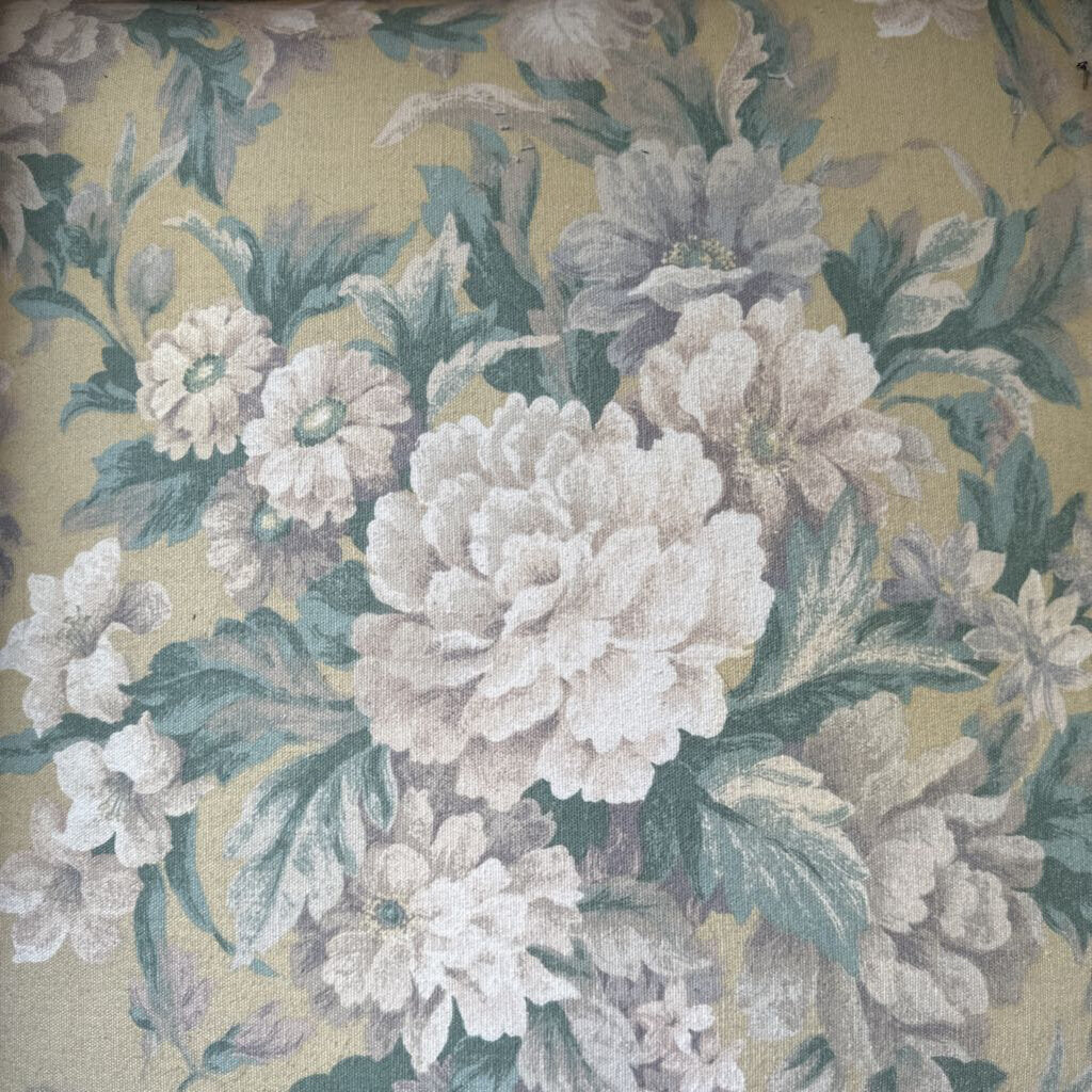 Floral pattern with white and green flowers on a beige background