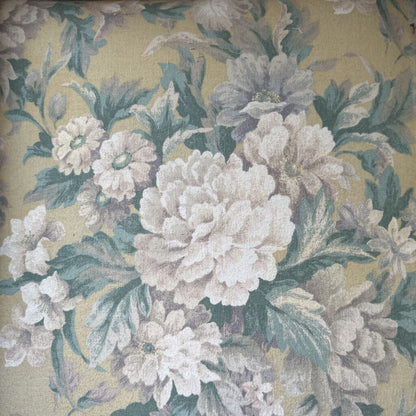Floral pattern with white and green flowers on a beige background