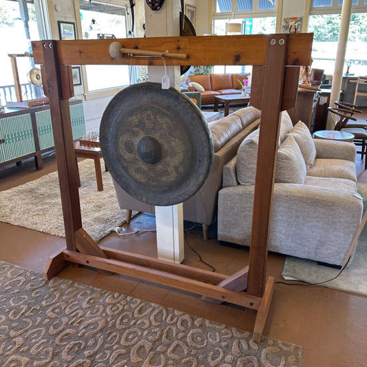 Gong on a stand in a living room setting