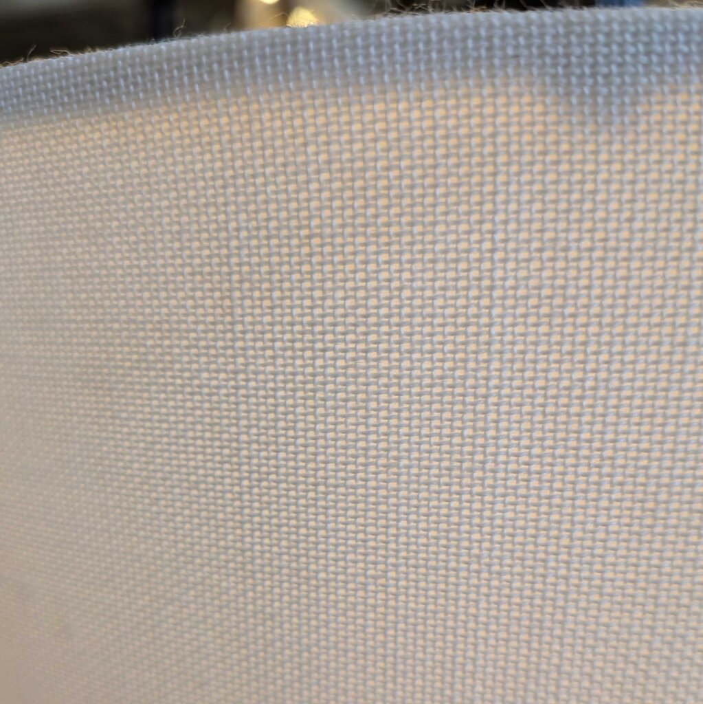 Close-up of a textured fabric with a subtle pattern