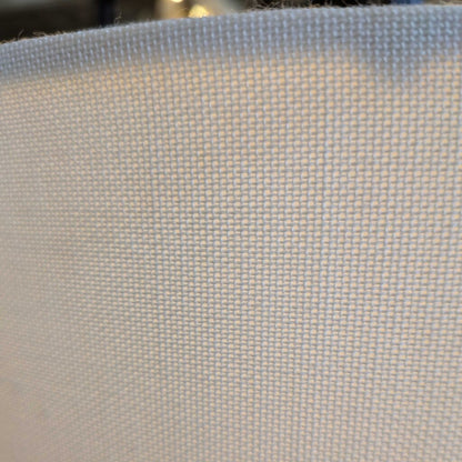 Close-up of a textured fabric with a subtle pattern