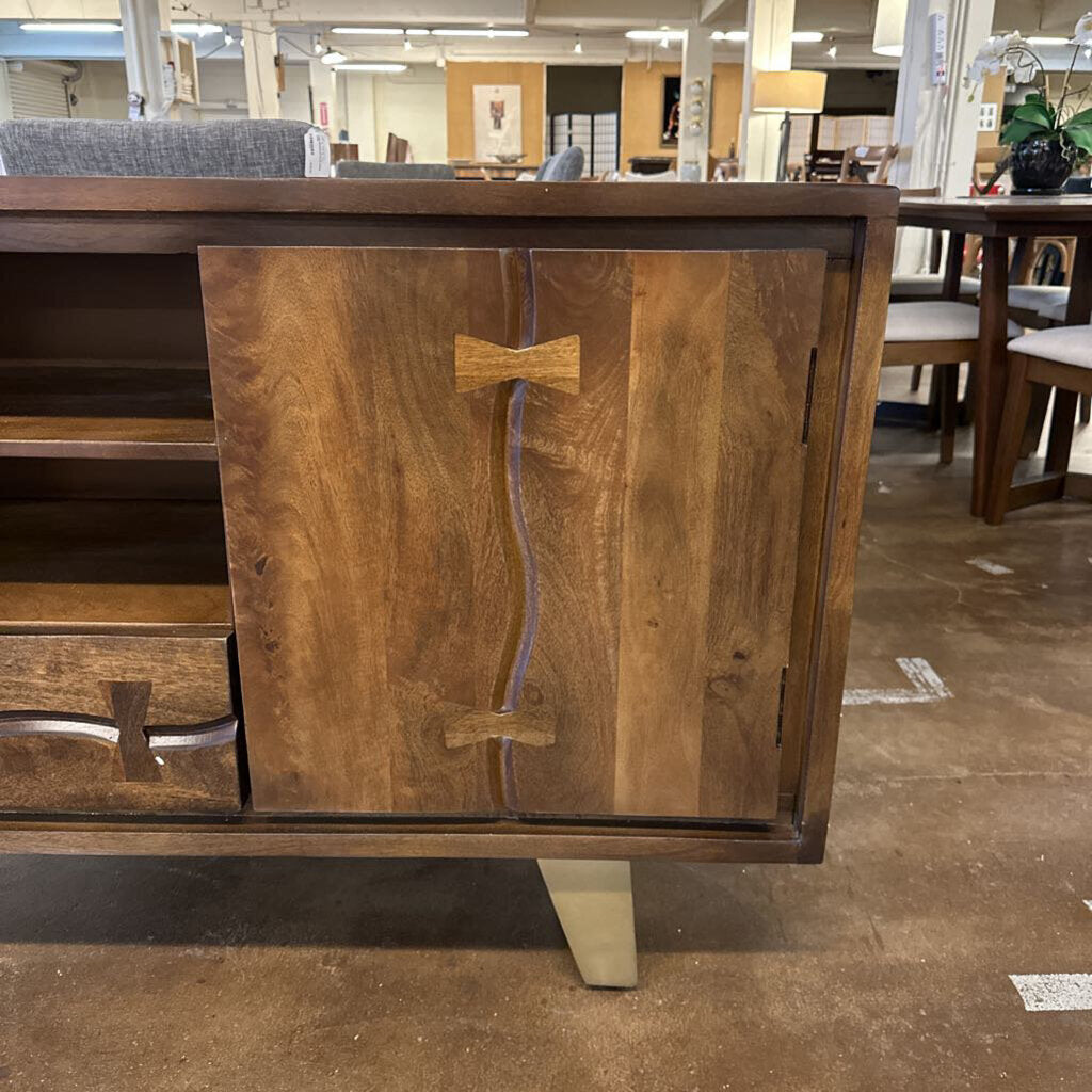Wooden cabinet with a bow design in a store setting