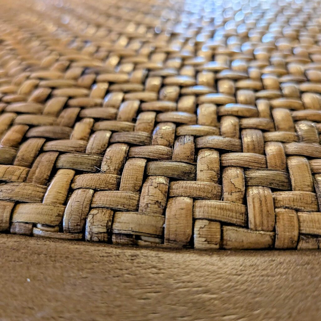Close-up of a woven mat with a textured pattern