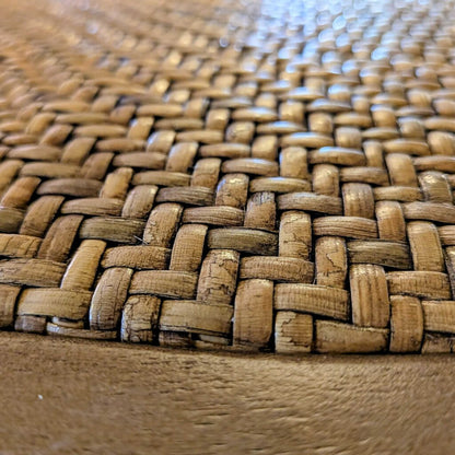 Close-up of a woven mat with a textured pattern