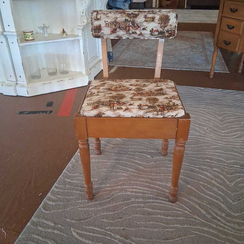 Wooden chair with patterned seat and backrest in a room setting