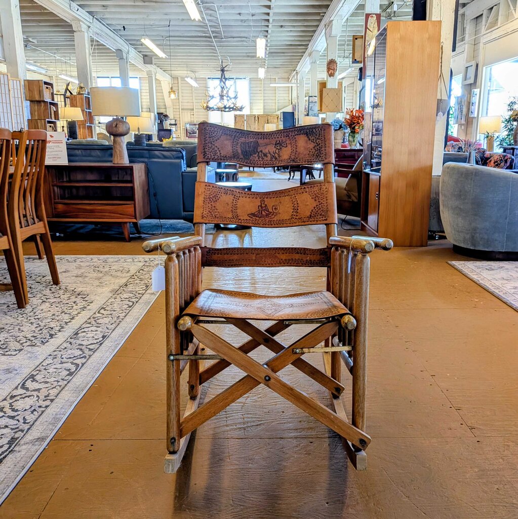Wooden director's chair in a furniture store with various items in the background