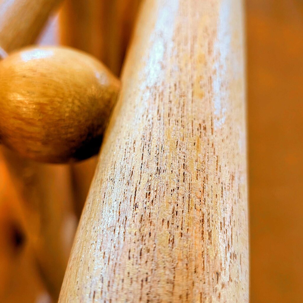Close-up of a wooden object with a blurred background