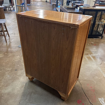 Wooden bar cabinet in a warehouse setting