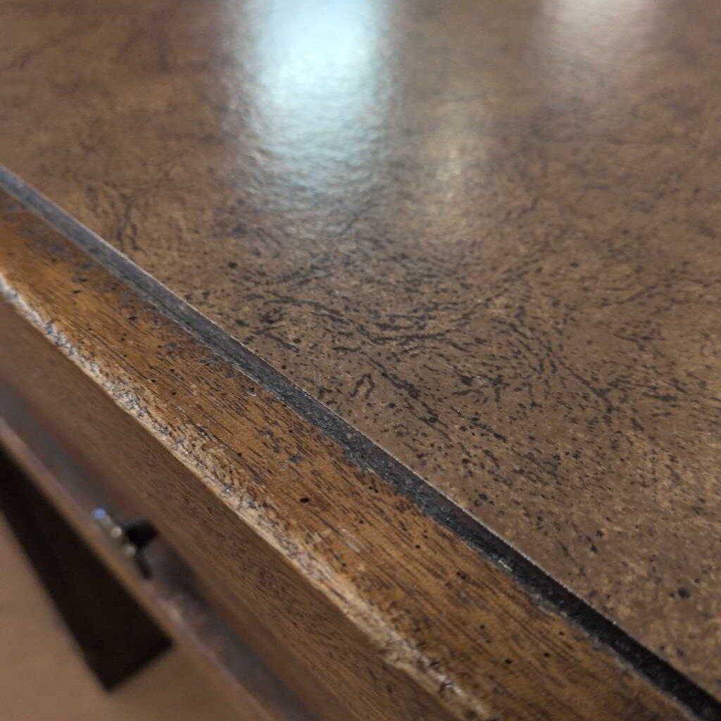 Close-up of a wooden surface with a visible grain pattern
