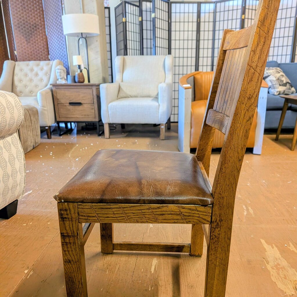 Wooden chair in a room with furniture and decor