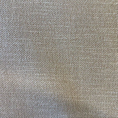 Close-up of a textured beige fabric surface