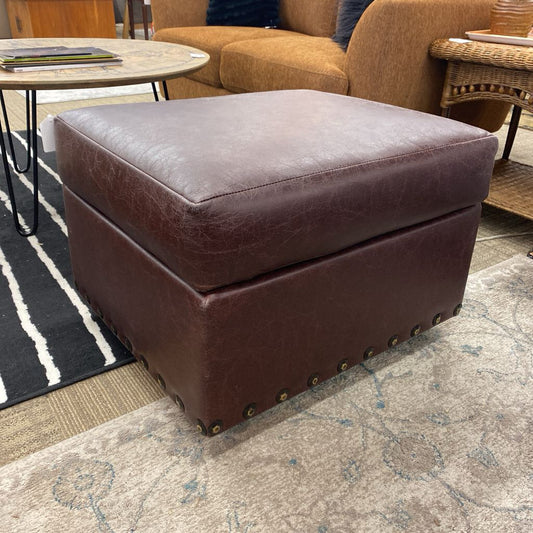 Rolling Brown Leatherette Ottoman