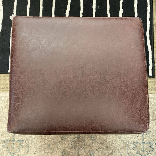 Rolling Brown Leatherette Ottoman