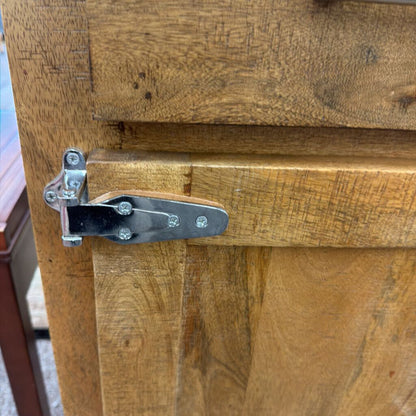 Wooden door with metal latch