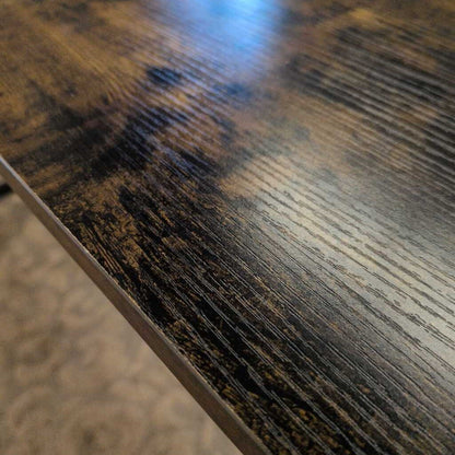 Close-up of a wooden surface with visible grain and texture
