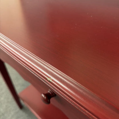 Close-up of a red cabinet with a handle