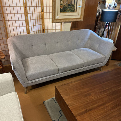 grey “bucket” sofa