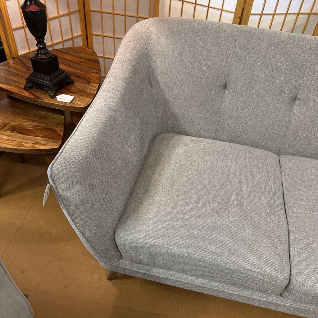 grey “bucket” sofa