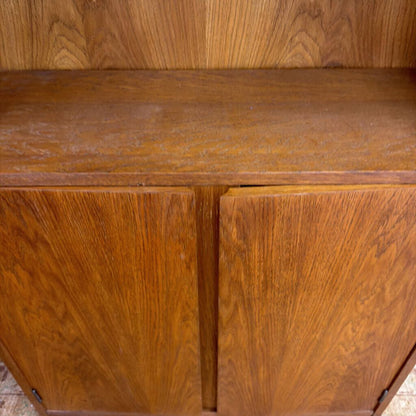 Close-up of a wooden cabinet with a focus on texture and color.
