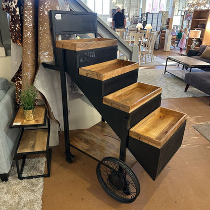 Wooden and metal pet stairs in a store setting
