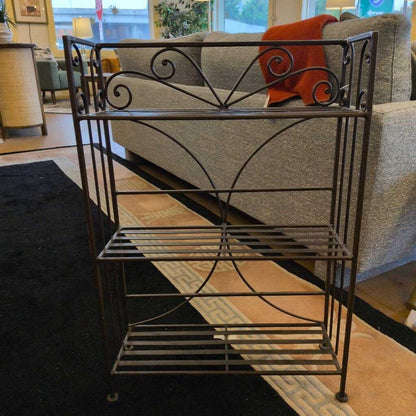 Wrought iron bookshelf in a living room setting