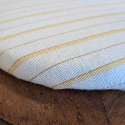Close-up of a striped fabric on a wooden surface