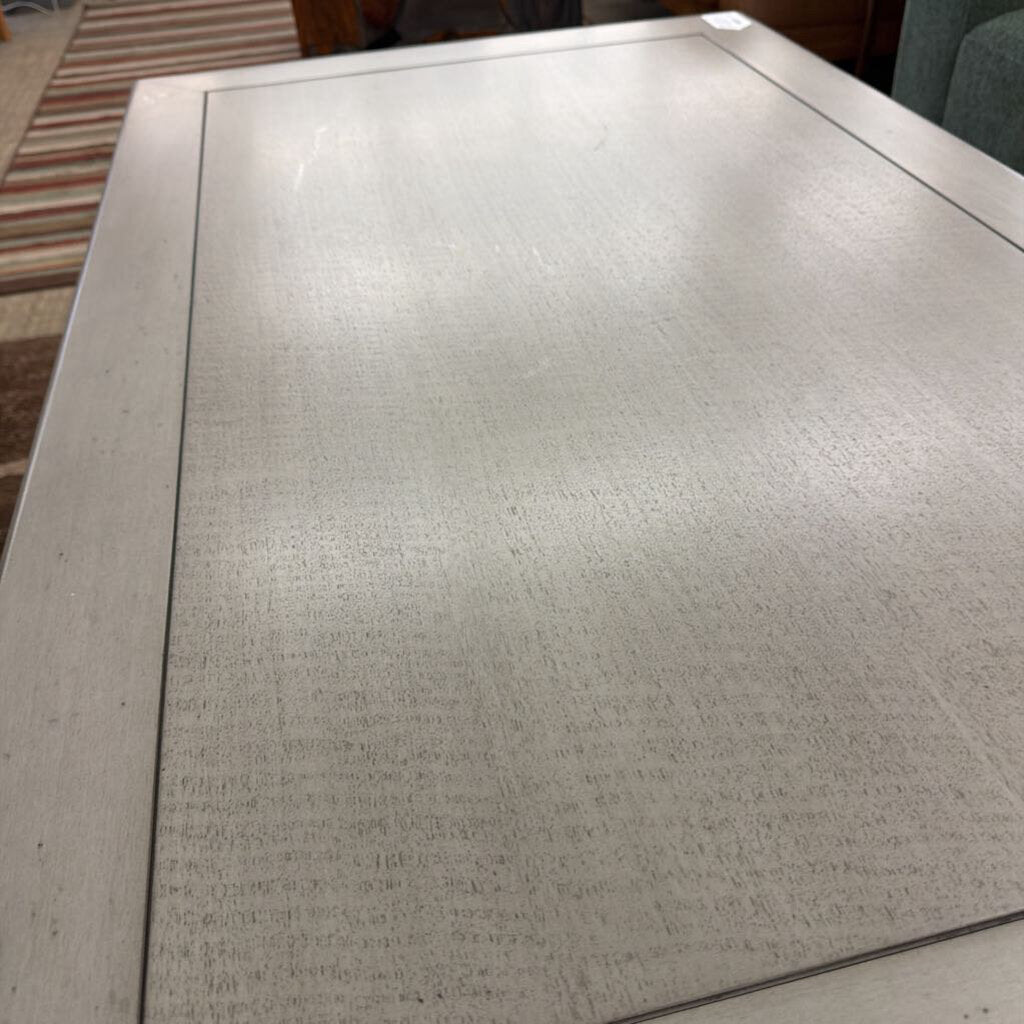 Close-up of a textured gray surface with a visible seam