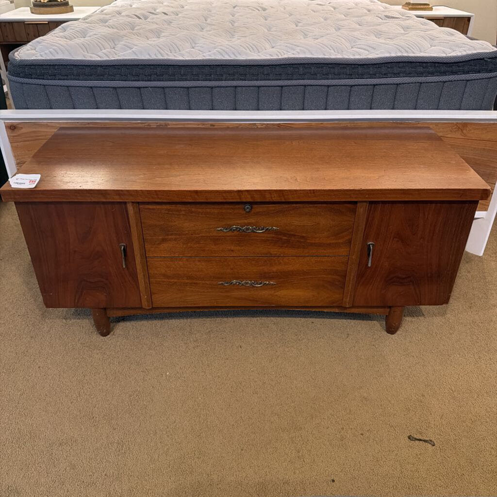 Wooden dresser with two drawers in a bedroom setting