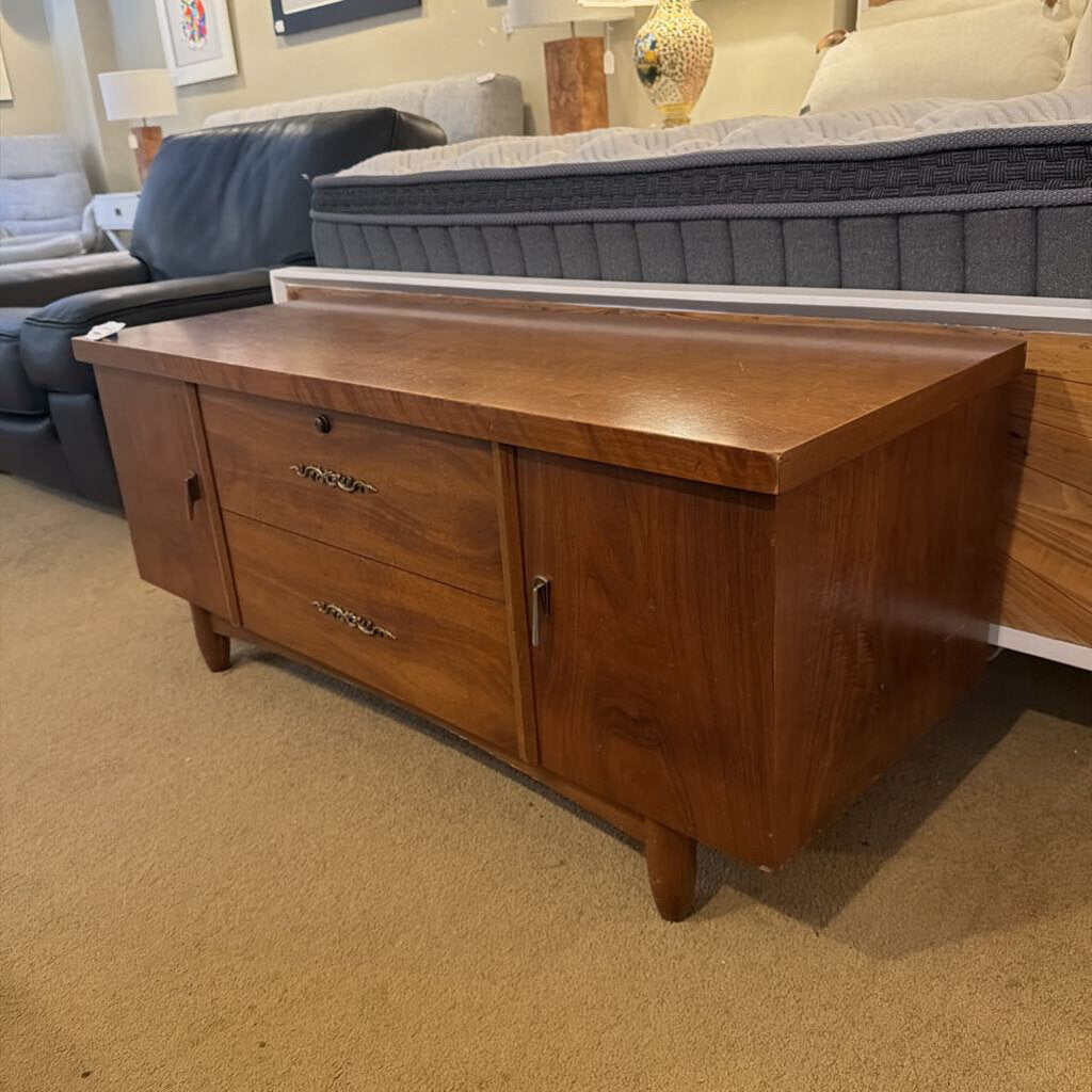 Wooden dresser in a room with furniture and decor