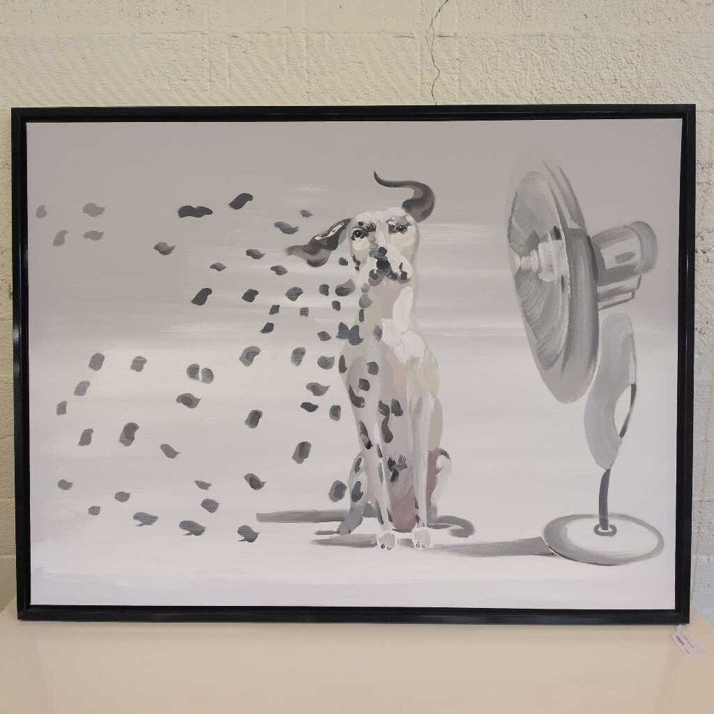 Framed artwork of a Dalmatian dog next to a fan on a white background