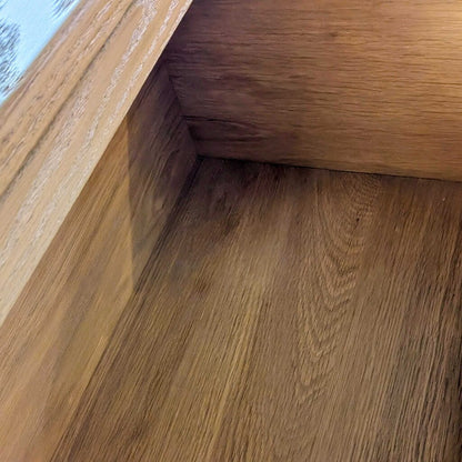 Close-up of a wooden floor with a visible grain pattern