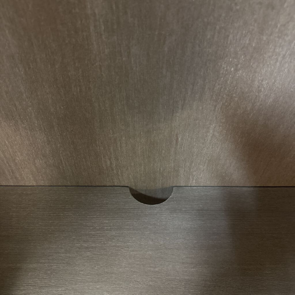 Close-up of a wooden surface with a visible grain pattern