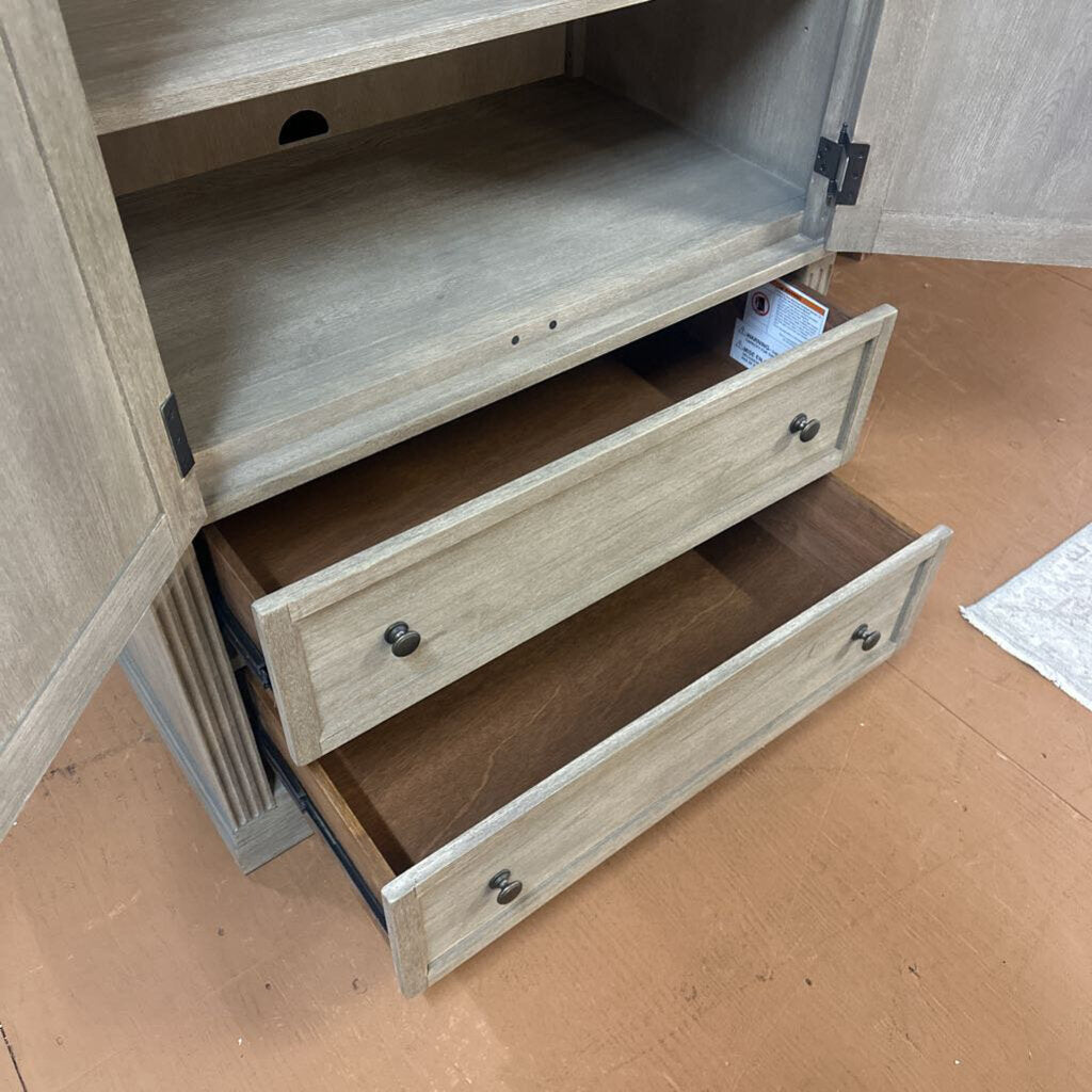 Wooden cabinet with open drawer on a wooden floor