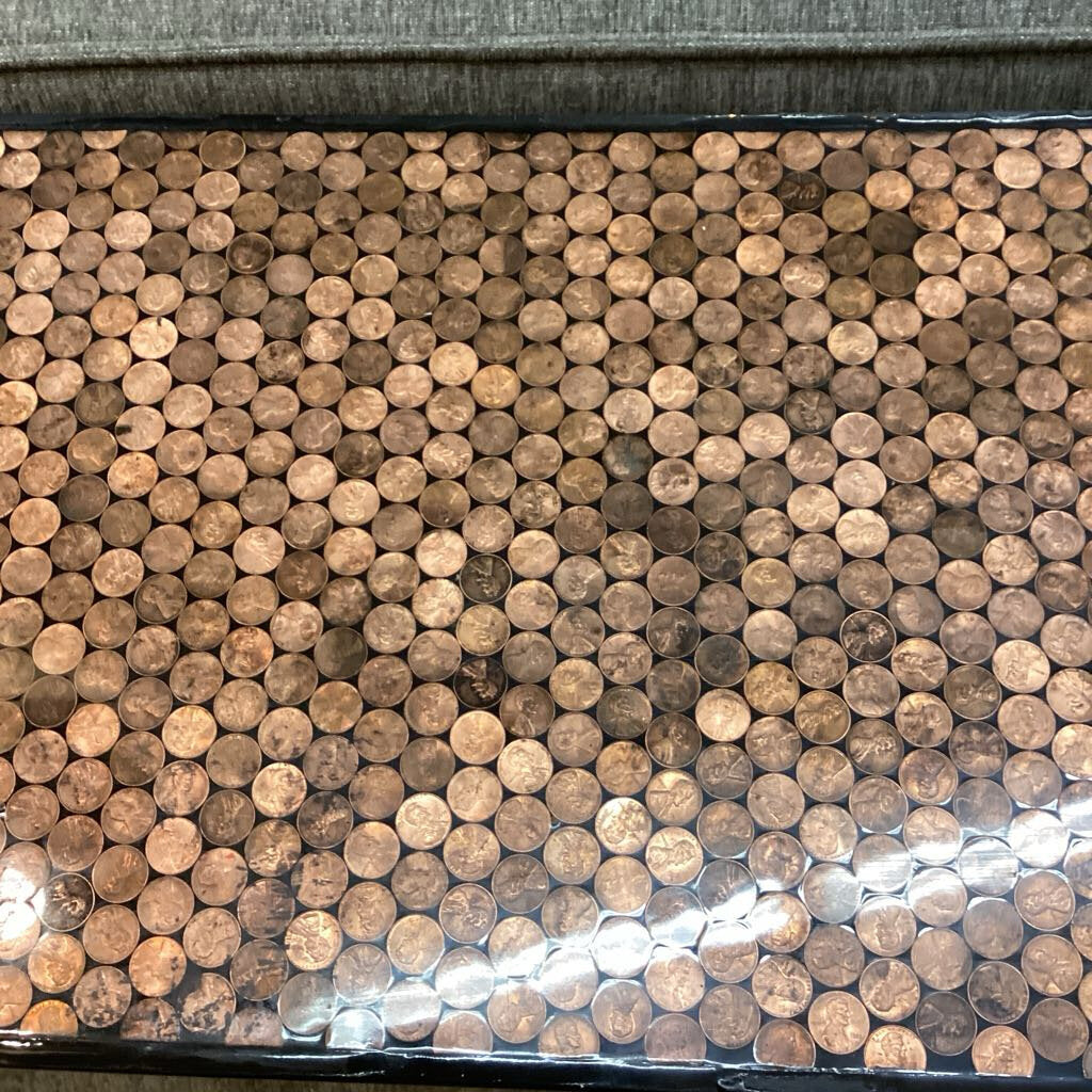 Close-up of a cork mat with round cork pieces.