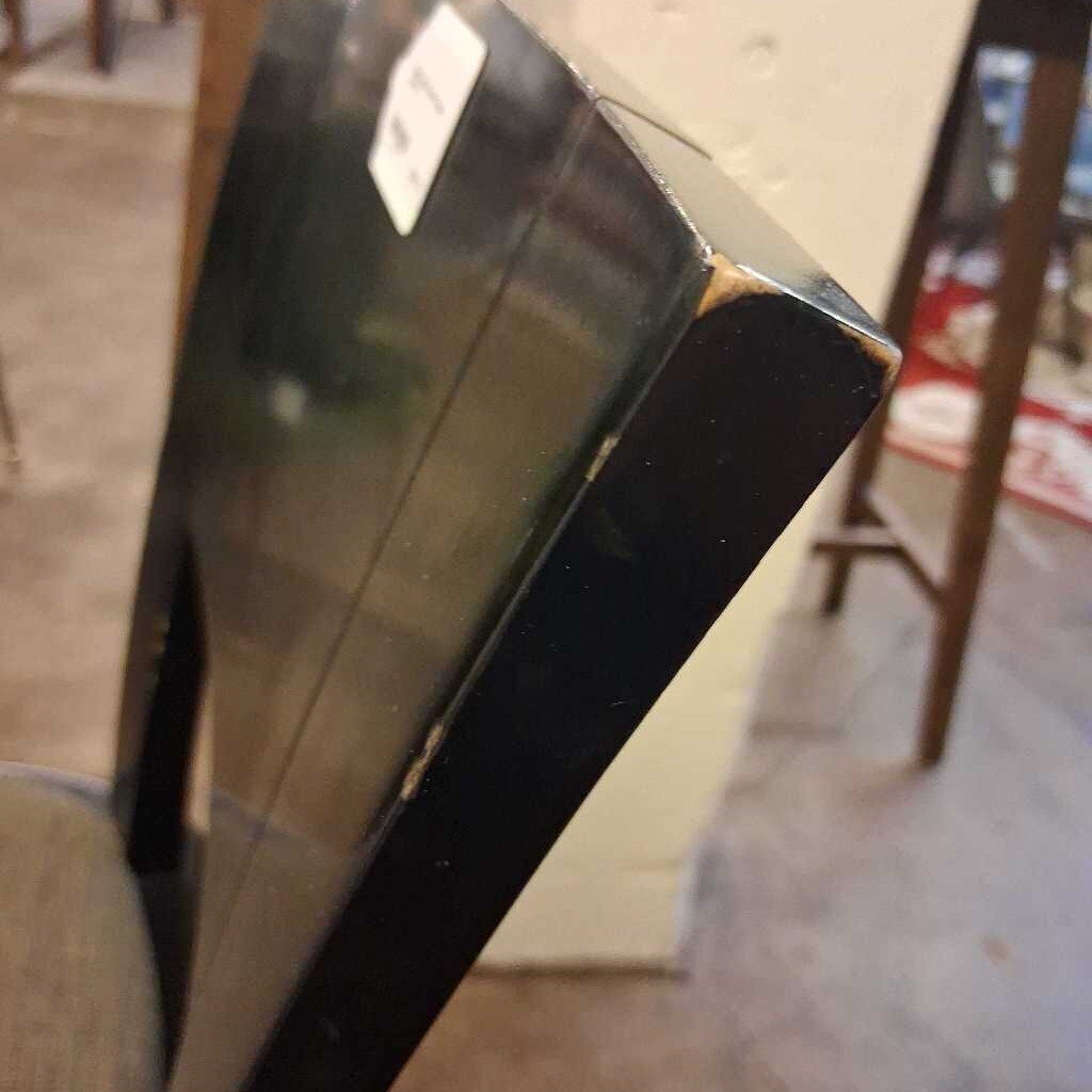 Close-up of a metallic object with a blurred background