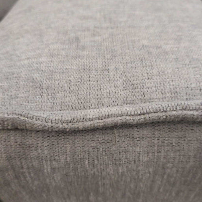 Close-up of a textured gray fabric surface
