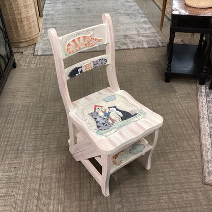 Decorative chair with quilted seat and backrest on a carpeted floor.
