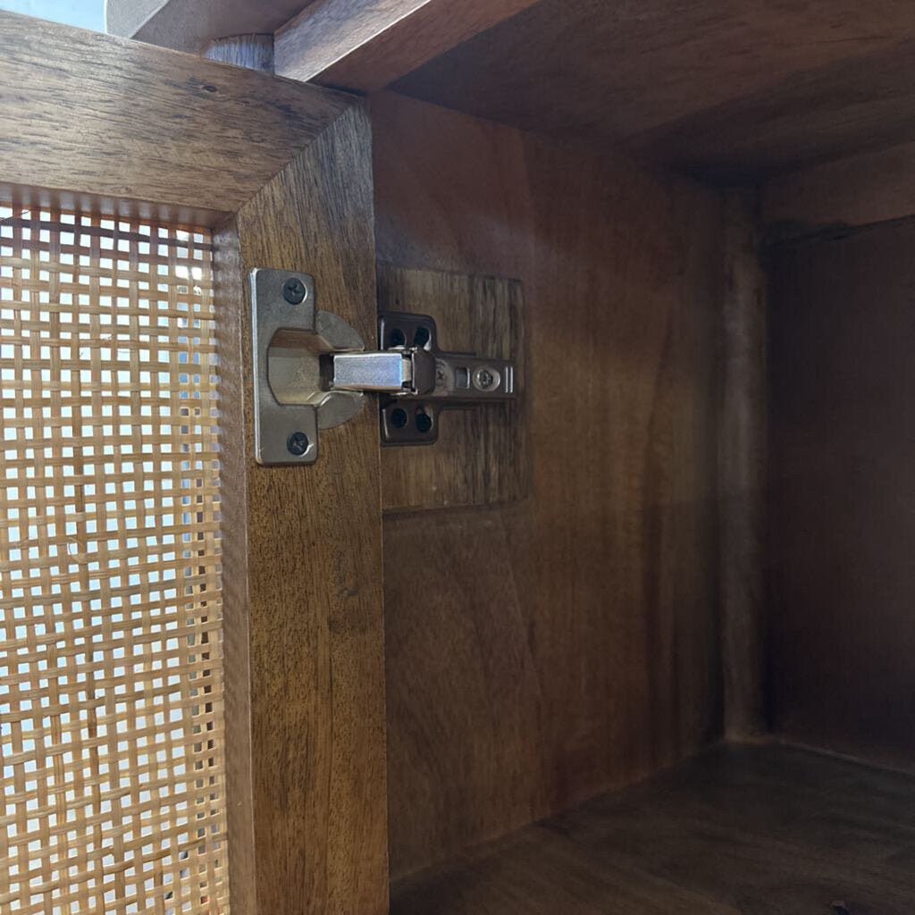 Wooden cabinet with a metal hinge