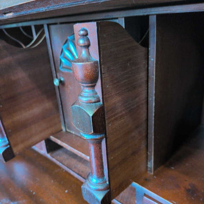Close-up of a wooden cabinet with ornate detailing