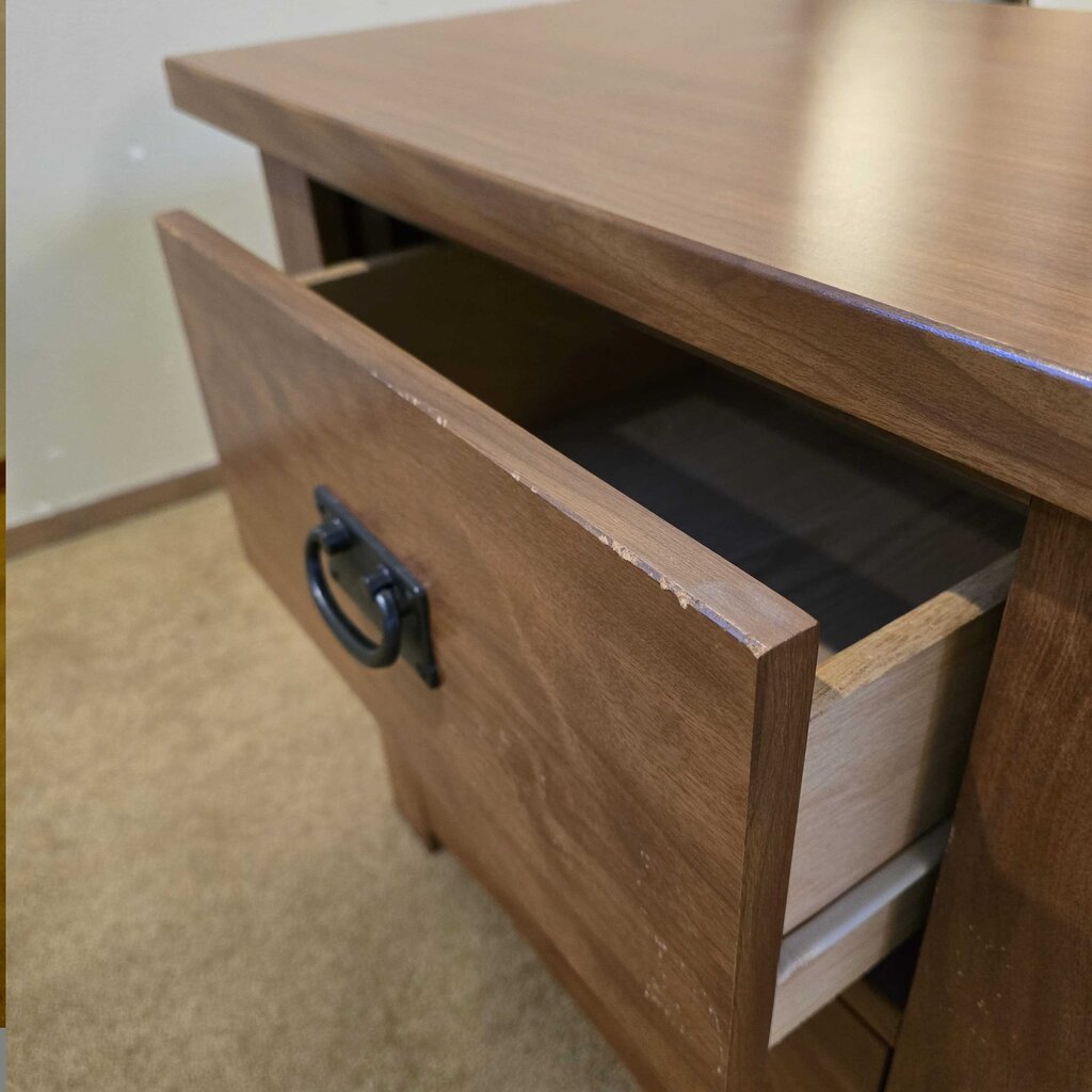 Wooden drawer with open drawer on a wooden cabinet