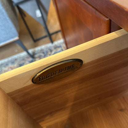 Wooden product with 'Braedwin' branding on a blurred background