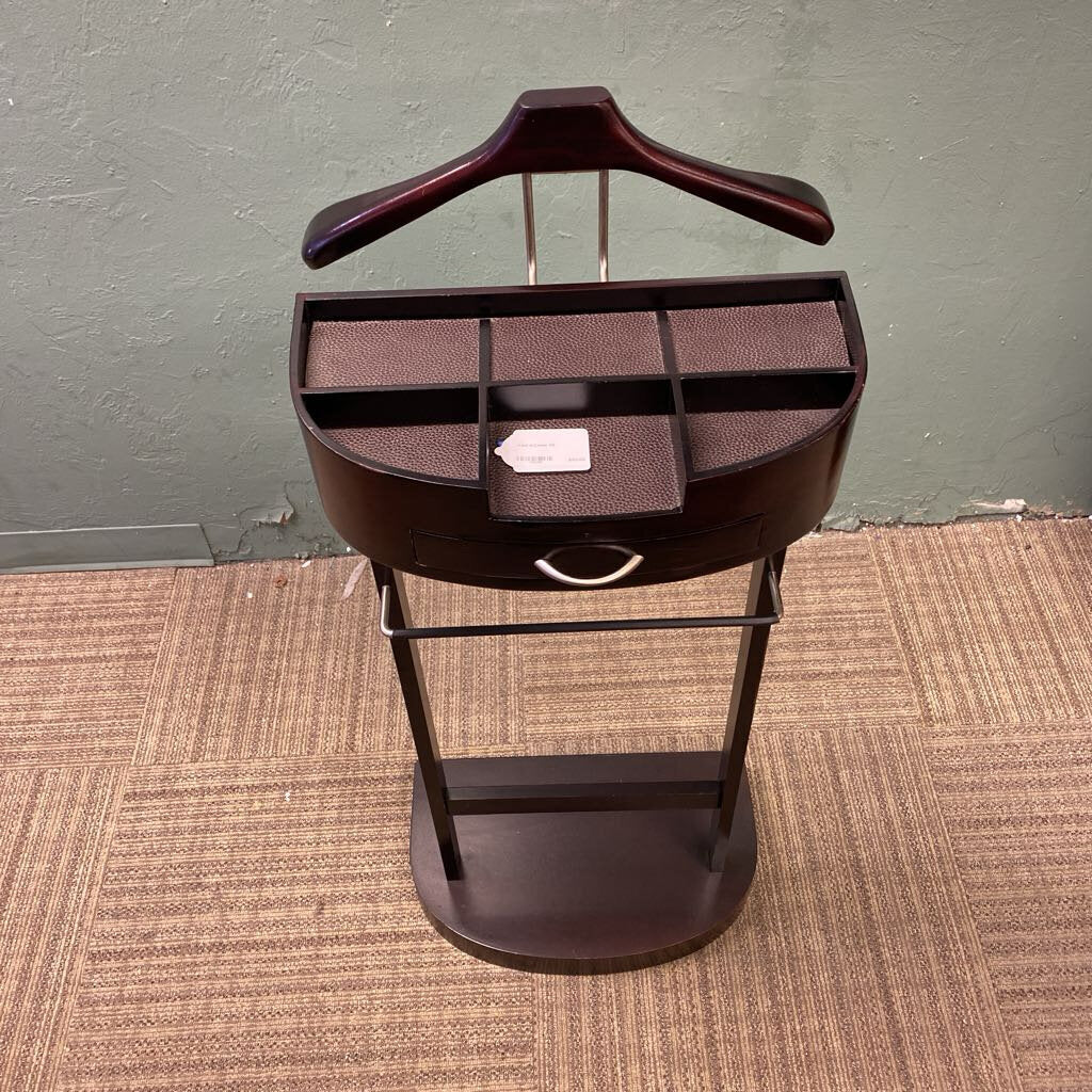 Brown valet tray with compartments on a gray background